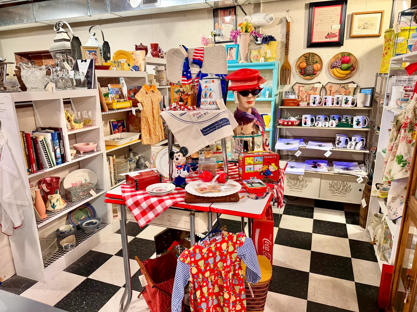 A retro kitchen booth with a red gingham table